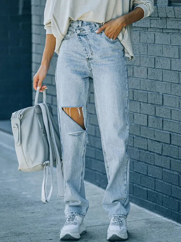 Irregularly torn edges and holes Ripped Jeans