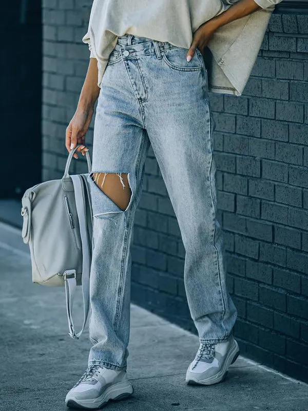 Irregularly torn edges and holes Ripped Jeans