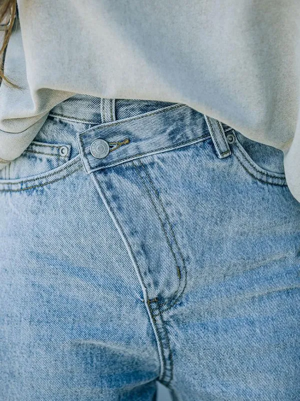 Irregularly torn edges and holes Ripped Jeans